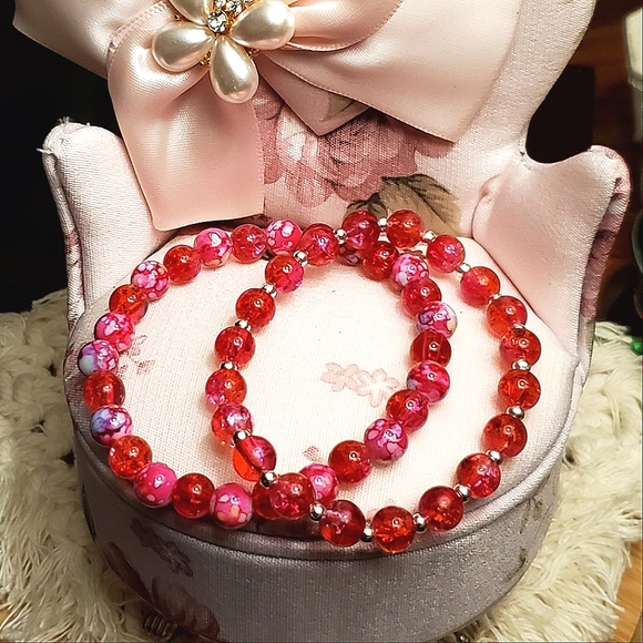 Set of 2 rose pink acrylic stretch bracelets. - Picture 1 of 5